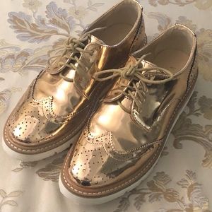 Barely worn rose gold wingtips